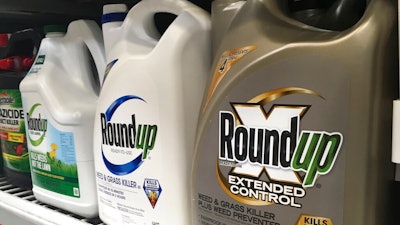 In this Sunday, Feb. 24, 2019 file photo, containers of Roundup are displayed on a store shelf in San Francisco. A jury in federal court in San Francisco has concluded that Roundup weed killer was a substantial factor in a California man's cancer. The unanimous verdict on Tuesday, March 19, 2019, came in a trial that plaintiffs' attorneys said could help determine the fate of hundreds of similar lawsuits against Roundup's manufacturer, agribusiness giant Monsanto.
