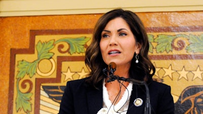 In this Jan. 8, 2019 file photo, South Dakota Gov. Kristi Noem gives her first State of the State address in Pierre, S.D. Noem says she's proposing legislation ahead of the Keystone XL oil pipeline's construction that would create a legal avenue to pursue out-of-state money that funds protests aimed at slowing construction. The Republican governor said Monday, March 4, 2019 that she wants to make sure Keystone XL and future pipelines are built safely and efficiently while shielding the state and counties from major law enforcement costs if there are riots.