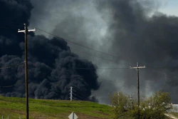 The petrochemical fire at Intercontinental Terminals Company reignited as crews tried to clean out the chemicals that remained in the tanks Friday, March 22, 2019, in Deer Park, Texas. The efforts to clean up a Texas industrial plant that burned for several days this week were hamstrung Friday by a briefly reignited fire and a breach that led to chemicals spilling into the nearby Houston Ship Channel.