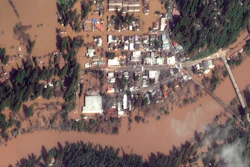 This satellite image shows The Russian River flooding Guerneville, California. The storm-swollen river is slowly receding after causing extensive flooding, but more rainfall is expected.