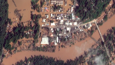 This satellite image shows The Russian River flooding Guerneville, California. The storm-swollen river is slowly receding after causing extensive flooding, but more rainfall is expected.
