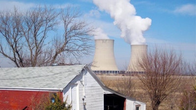 In this March 16, 2011, file photo, steam escapes from Exelon Corp.'s nuclear plant in Byron, Ill. The nuclear power industry is pushing the Nuclear Regulatory Commission to cut back on inspections at nuclear power plants and throttle back what it tells the public about plant problems.
