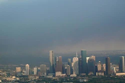 A plume of smoke from a petrochemical fire at the Intercontinental Terminals Company is shown over downtown Houston Monday, March 18, 2019. The large fire at the Houston-area petrochemicals terminal will likely burn for another two days, authorities said Monday, noting that air quality around the facility was testing within normal guidelines.