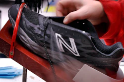 In this Dec. 17, 2018, file photo, a pair of athletic shoes designed for the military are laced up at a New Balance factory in Norridgewock, Maine. On Friday, March 1, 2019, the Institute for Supply Management, a trade group of purchasing managers, issues its index of manufacturing activity for February.