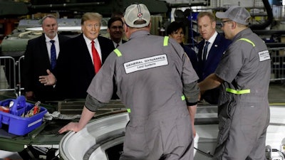 President Donald Trump takes a tour of the Lima Army Tank Plant, Wednesday, March 20, 2019, in Lima, Ohio.