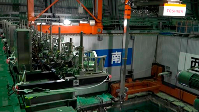 This image released by Tokyo Electric Power Co. (TEPCO) shows the operation floor above a cooling pool at Unit 3 of the Fukushima nuclear power plant in Okuma town, Fukushima prefecture, northeastern Japan, Monday, April 15, 2019. The operator TEPCO of the tsunami-wrecked Fukushima nuclear plant began removing fuel from the cooling pool at one of three reactors that melted down in the 2011 disaster, a milestone in the decades-long process to decommission the plant.
