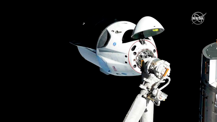 In this Sunday, March 3, 2019 file photo provided by NASA, the SpaceX Crew Dragon is pictured about 20 meters (66 feet) away from the International Space Station's Harmony module. Officials say SpaceX's new capsule for astronauts suffered an 'anomaly' during a routine engine test firing in Florida, causing smoke to be seen for miles. Forty-fifth Space Wing Spokesman Jim Williams tells Florida Today that the anomaly happened Saturday, April 20, 2019 at Cape Canaveral Air Force Station while the SpaceX Crew Dragon capsule was undergoing a 'static test fire.'
