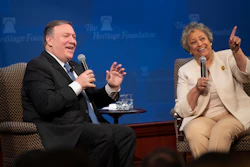 In this May 21, 2018, file photo Secretary of State Mike Pompeo, left, joined by Heritage Foundation President Kay Coles James, speaks at the Heritage Foundation, a conservative public policy think tank, in Washington. Google employees have had more success than other tech workers at demanding change at the company. Google dropped a contract with the Pentagon after employees pushed back on the ethical implications of using company technology to analyze drone video. And after more than 2,400 Google employees signed a petition calling for James to be taken off the board, Google scrapped the board altogether.