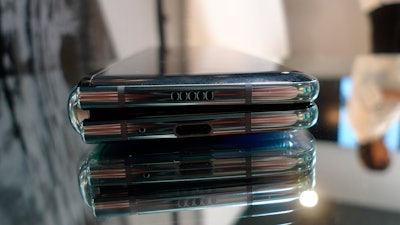 In this April 16, 2019, file photo, the Samsung Galaxy Fold phone is seen in its folded position during a media preview event in London. Some of Samsung's new $2,000 folding phones appear to be breaking after just a couple of days. Journalists who received the phones to review before the public launch say the Galaxy Fold screen started flickering and turning black before completely fizzling out.