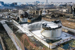 In this file photo taken on March 22, 2019, and released by Xinhua News Agency, foam is sprayed at the site of an explosion at a chemical industrial park in Xiangshui county of Yancheng in eastern China's Jiangsu Province. Authorities are shutting down an eastern China industrial park after 78 people were killed last month by a chemical explosion. The city government said Friday, April 5, 2019 that local departments have met to discuss how to eliminate chemical plants with low safety standards and severe pollution issues.