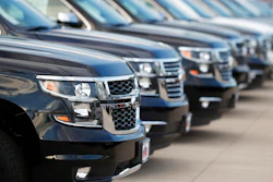 This June 24, 2018, photo shows unsold 2018 Suburbans at a Chevrolet dealership in Englewood, Colo. Automobile sales in the U.S. fell 2% in the first quarter, another sign the nation's economy is starting to slow.