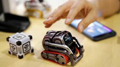 In this Jan. 10, 2018, file photo, Anki Cozmo coding robot is on display at CES International in Las Vegas. A startup that tried to advance the dream of intelligent robots in the home with its toy robot Cozmo is shutting down. San Francisco-based Anki says it’s laying off its employees on Wednesday, May 1, 2019 after failing to raise enough money to keep the business going. It’s one of several high-profile makers of consumer robots to fold in the past year.