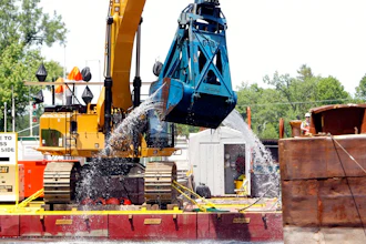 In this June 10, 2011 file photo, crews dredge the Hudson River in Fort Edward, N.Y. The work is part of a project on the upper-Hudson to clean up PCBs released by General Electric decades ago. The Environmental Protection Agency is poised to make an announcement Thursday, April 11, 2019, on GE's $1.7 billion Hudson River cleanup.