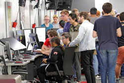 People play new video games during the Entertainment Arts and Engineering Program Launch event at the Master Games Studio on the University of Utah campus Wednesday, April 24, 2019, in Salt Lake City. Drones ferrying medical supplies, packages and even pizza could one day be crisscrossing the skies above U.S. cities, and a team at the University of Utah is working with regulators to keep that traffic in check using a video game.