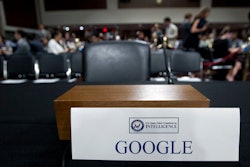 n this Sept. 5, 2018, file photo an empty chair reserved for Google's parent Alphabet, which refused to send its top executive, is seen before the Senate Intelligence Committee hearing on Capitol Hill in Washington.