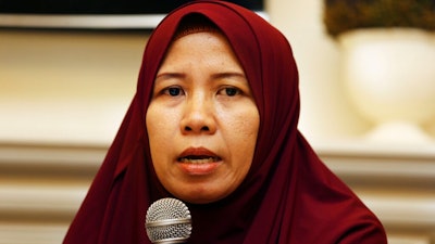 Merdian Agustin family of a victim of the Lion Air jet that crashed into the Java Sea talks to journalists during a press conference in Jakarta, Monday, April 8, 2019. More families of victims of the Lion Air crash in Indonesia are suing Boeing Co. after its chief executive apologized last week and said a software update for the MAX 8 jet would prevent further disasters.