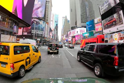 Motorists roll south on 7th Avenue in Times Square, Friday, March 29, 2019, in New York. A congestion toll that would charge drivers to enter New York City's central business district is a first for an American city. State legislators included it in the New York state budget that was approved Monday.