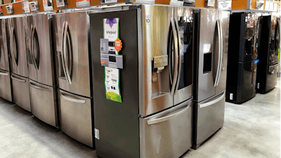 In this Tuesday, April 23, 2019 photo, refrigerators are shown for sale at a Home Depot store in Miami Lakes, Fla. On Thursday, April 25, the Commerce Department releases its March report on durable goods.
