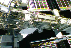 In this photo provided by NASA, NASA astronaut Anne McClain works outside the International Space Station, Monday, April 8, 2019. McClain and Canadian astronaut David Saint-Jacques got an early start Monday morning as they tackled battery and cable work outside the International Space Station. It's the third spacewalk in just 2 ½ weeks for the station crew.