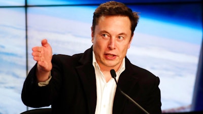 In this March 2, 2019 file photo, Elon Musk, CEO of SpaceX, speaks during a news conference after the SpaceX Falcon 9 Demo-1 launch at the Kennedy Space Center in Cape Canaveral, Fla. Tesla plans to cut its board of directors from 11 to seven in a move the car maker says will allow the board to act more nimbly and efficiently. Tesla says the four directors who will depart aren't leaving because of any disagreement with the company. Tesla disclosed the changes in regulatory filings Friday, April 19, 2019.