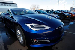 In this Sunday, Feb. 3, 2019, file photograph, an unsold 2019 S75D sits at a Tesla dealership in Littleton, Colo. Tesla's assembly lines slowed down during a rocky start to the new year, which will likely magnify nagging doubts about whether the electric car pioneer will be able to make the leap into mass market.