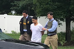 Xiaoqing Zheng has remained free on bond after he was arrested on Aug. 1, 2018.