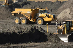 In this Nov. 14, 2017 file photo, crews with Duke Energy continue to remove coal ash from the old coal ponds at the Sutton Plant, in Wilmington, N.C. Duke Energy Corp., the country’s largest electric company, was ordered Monday, April 1, 2019 to excavate coal ash from all of its North Carolina power plant sites, slashing the risk of toxic chemicals leaking into water supplies but potentially adding billions of dollars to the costs consumers pay.