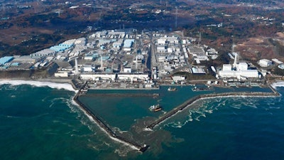 This Nov. 22, 2016, aerial file photo shows Fukushima Dai-ichi nuclear power plant in Okuma, Fukushima prefecture, Japan. The World Trade Organization has upheld South Korea's import ban on Japanese seafood from areas affected by the 2011 nuclear disaster in Fukushima. South Korea on Friday, April 12, 2019, welcomed the decision and said it will continue to block all fishery products from Fukushima and seven neighboring prefectures to ensure 'only foods that are confirmed as safe are put on the table.'