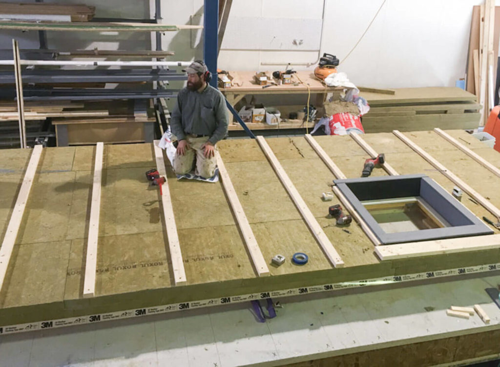 Photo by GO Logic Construction work on Go Lab, Inc.'s panelized Passive House wall system, which delivers R-50 thermal performance at the exterior walls.