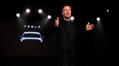 In this March 14, 2019, file photo Tesla CEO Elon Musk speaks before unveiling the Model Y at Tesla's design studio in Hawthorne, Calif. A federal judge will hear oral arguments Thursday, April 4, about whether Tesla CEO Elon Musk should be held in contempt of court for violating an agreement with the U.S. Securities and Exchange Commission.
