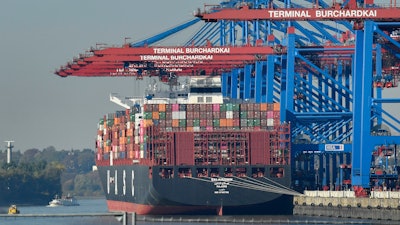 In this file photo, a container ship is loaded at the harbor in Hamburg, Germany. The United States is considering putting tariffs on $11 billion in EU goods per year to offset what it says are unfair European subsidies for plane maker Airbus.