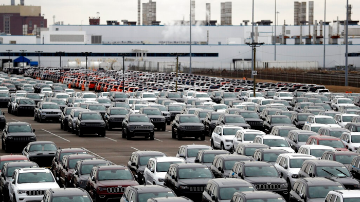 In this Feb. 26, 2019 file photo, Jeep vehicles are parked outside the Jefferson North Assembly Plant in Detroit. Land deals that will allow Fiat Chrysler to build a new assembly plant in Detroit are expected to cost the city and state about $107 million. Mayor Mike Duggan released details Friday of agreements reached for nearly 215 acres on the city's east side that the automaker wants as part of a $1.6 billion investment.