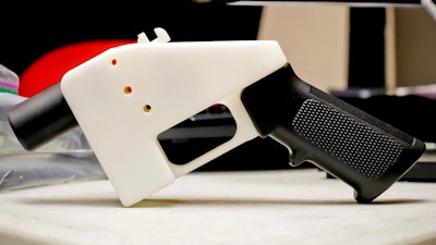 This Aug. 1, 2018 file photo, shows a 3D-printed gun called the Liberator at Defense Distributed, an online organization for weapons development, in Austin, Texas. New York's Democrat-controlled state Legislature has approved a measure that would ban the manufacture, sale and possession of 3D-printed guns and other undetectable firearms. The Assembly passed the bill Monday, May 20, 2019, five days after the legislation was approved by the Senate.