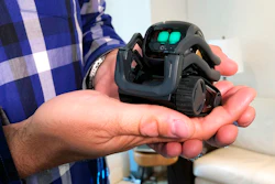 In this July 30, 2018, file photo, Anki Inc. CEO Boris Sofman holds Vector, the company's new home robot, in New York. The wheeled robot is designed as a successor to the San Francisco company's toy robot, Cozmo, which was introduced in 2016. Hopes that the tech industry was on the cusp of rolling personal robots into homes are dimming now that several once-promising consumer robotics companies have shut down.