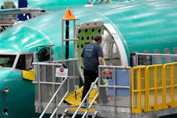 This March 27, 2019, file photo shows a Boeing 737 MAX 8 airplane on the assembly line during a brief media tour of Boeing's 737 assembly facility in Renton, Wash. Recent crashes have caused an uptick in airline fatalities in 2018 and 2019 after a long trend of safer flying. Boeing 737 Max accidents have raised concern over the ability of all pilots to handle automation. Still, aviation deaths are down sharply from the 1990s, and experts credit advances in aircraft and airport design, better air traffic control, and more pilot training.