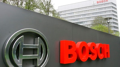 In this April 27, 2006 file photo, the logo of the Robert Bosch GmbH in front of the company's headquarters in Gerlingen near Stuttgart, southwestern Germany. German prosecutors have fined auto components and technology company Robert Bosch GmbH 90 million euros ($100 million) over its role in the diesel emissions scandal that erupted at Volkswagen in 2015.