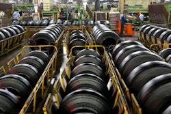 In this April 28, 2019, photo, workers assemble truck's tires at a plant in Nantong city in east China's Jiangsu province Sunday, April 28, 2019. China's exports fell in April amid a bruising tariff war with Washington, adding to pressure on Beijing on the eve of negotiations aimed at settling the fight over its technology ambitions.