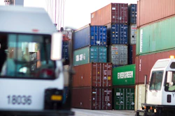 In this July, 5, 2018, file photo, two jockey truck drivers pass each other in the container yard where rubber tire gantry load and unload 40-foot shipping container at the Port of Savannah in Savannah, Ga. President Donald Trump turned up the pressure on China Sunday, May 5, 2019, threatening to hike tariffs on $200 billion worth of Chinese goods.