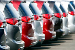 In this April 15, 2018, file photo, unsold 2018 Pacifica minivans sit on a Chrysler dealer's lot in the south Denver suburb of Englewood, Colo. Fiat Chrysler is recalling over 208,000 minivans in North America because they could lose power-assisted steering or engines can stall. The recall covers certain Chrysler Pacifica minivans from the 2017 through 2019 model years. All have systems that stop the engine for traffic lights and restart it when a driver presses the gas pedal.