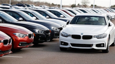 This Jan. 13, 2019, file photo shows a lineup of 3 Series sedans at a BMW dealership in Highlands Ranch, Colo. BMW offers free maintenance but the duration in 2019 isn't as generous as it used to be.