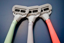 In this Oct. 11, 2018 file photo razors from Harry's shaving and body care brand Flamingo are displayed in New York. Edgewell Personal Care is acquiring upstart razor maker Harry’s in a cash-and-stock deal for $1.37 billion. Edgewell and other larger personal care companies have been steadily losing market share to smaller, direct-to-consumer companies like Harry’s, known for its brightly-colored disposable razors.