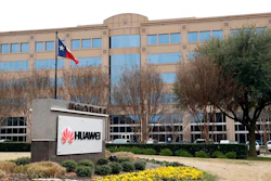In this Thursday, March 7, 2019 file photo, the Texas state flag files outside the Huawei Technologies Ltd. business location in Plano, Texas. President Donald Trump issued an executive order Wednesday, May 15, 2019, apparently aimed at banning equipment from Chinese telecommunications giant Huawei from U.S. networks. It does not name specific countries or companies and gives the Department of Commerce 150 days to come up with regulations.