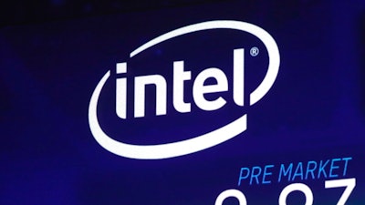 In this Oct. 3, 2018, file photo the Intel logo appears on a screen at the Nasdaq MarketSite, in New York's Times Square. Intel has revealed another hardware security flaw that could affects millions of machines around the world. The chipmaker said Tuesday, May 14, 2019, that there’s no evidence of bad actors exploiting the bug, which is embedded in the architecture of computer hardware.