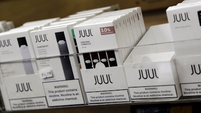 This Thursday, Dec. 20, 2018, file photo shows Juul products for sale. North Carolina’s attorney general has filed a lawsuit against the popular e-cigarette maker JUUL, asking a court to limit what flavors it can sell and ensure underage teens can’t buy it.