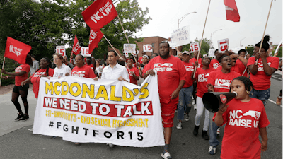 Presidential candidate and former U.S. Department of Housing and Urban Development Julian Castro rallies with McDonald's employees and other activists demanding fairer pay, better working conditions, and the right to unionize.