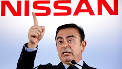 In this May 11, 2012, file photo, then Nissan Motor Co. President and CEO Carlos Ghosn speak during a press conference in Yokohama, near Tokyo. Nissan is seeing sales and profits tumble, as its once revered former chairman, Carlos Ghosn, awaits trial on charges of financial misconduct. The Japanese automaker says it is beefing up corporate governance and sticking with its alliance with French partner Renault SA.