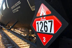 This Nov. 6, 2013, file photo, shows a warning placard on a tank car carrying crude oil near a loading terminal in Trenton, N.D. North Dakota officials are pressuring the state of Washington to back off from legislation requiring oil shipped by rail to have more of its volatile gases removed. Proponents of the bill awaiting Gov. Jay Inslee's signature say it will boost safety, but North Dakota officials worry it could hamper the nation's No. 2 oil producer. North Dakota's three members of Congress have asked Inslee to veto the bill. North Dakota regulators are considering a lawsuit.