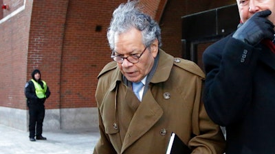 In this Jan. 30, 2019, file photo, Insys Therapeutics founder John Kapoor leaves federal court in Boston. On Thursday, May 2, 2019, Kapoor was found guilty in a scheme to bribe doctors to boost sales of a highly addictive fentanyl spray meant for cancer patients with severe pain.