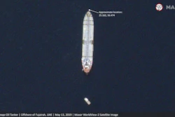 This satellite image provided by Maxar Technologies shows the Saudi-flagged oil tanker Al Marzoqa off the coast of Fujairah, United Arab Emirates, Monday, May 13, 2019. As many as four oil tankers anchored in the Mideast were damaged in what Gulf officials described Monday as a 'sabotage' attack off the coast of the United Arab Emirates.