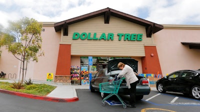 In this May 26, 2016, file photo, a shopper searches her purse outside a Dollar Tree store in Encinitas, Calif. Dollar Tree, Inc. reports financial results Thursday, May 30, 2019.